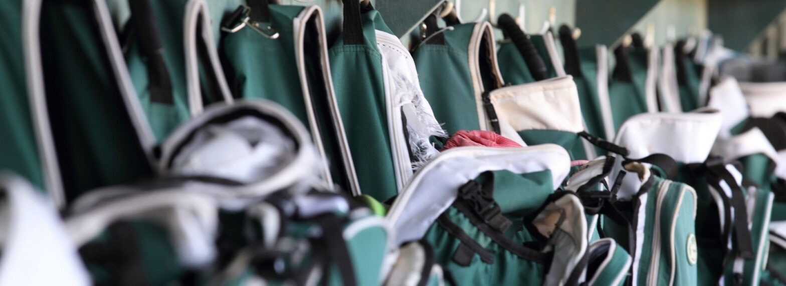 Team Backpacks with Equipment Hanging up